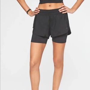 Athleta Racer Run 2 in 1 Womens Shorts M Black Elastic Waist Zip Pocket Logo